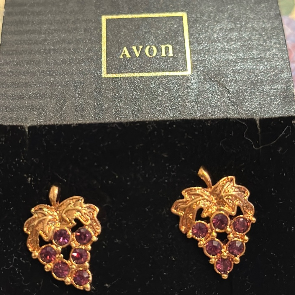 AVON “Grape” pierced earrings in box feature purple rhinestones  7/8” x 5/8”